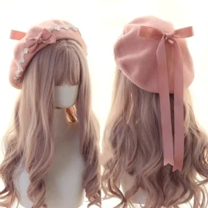 Soft pink Jirai Kei lace butterfly beret with matching pink ribbon bow tail, displayed on long wavy pink wig mannequin showing front and back views