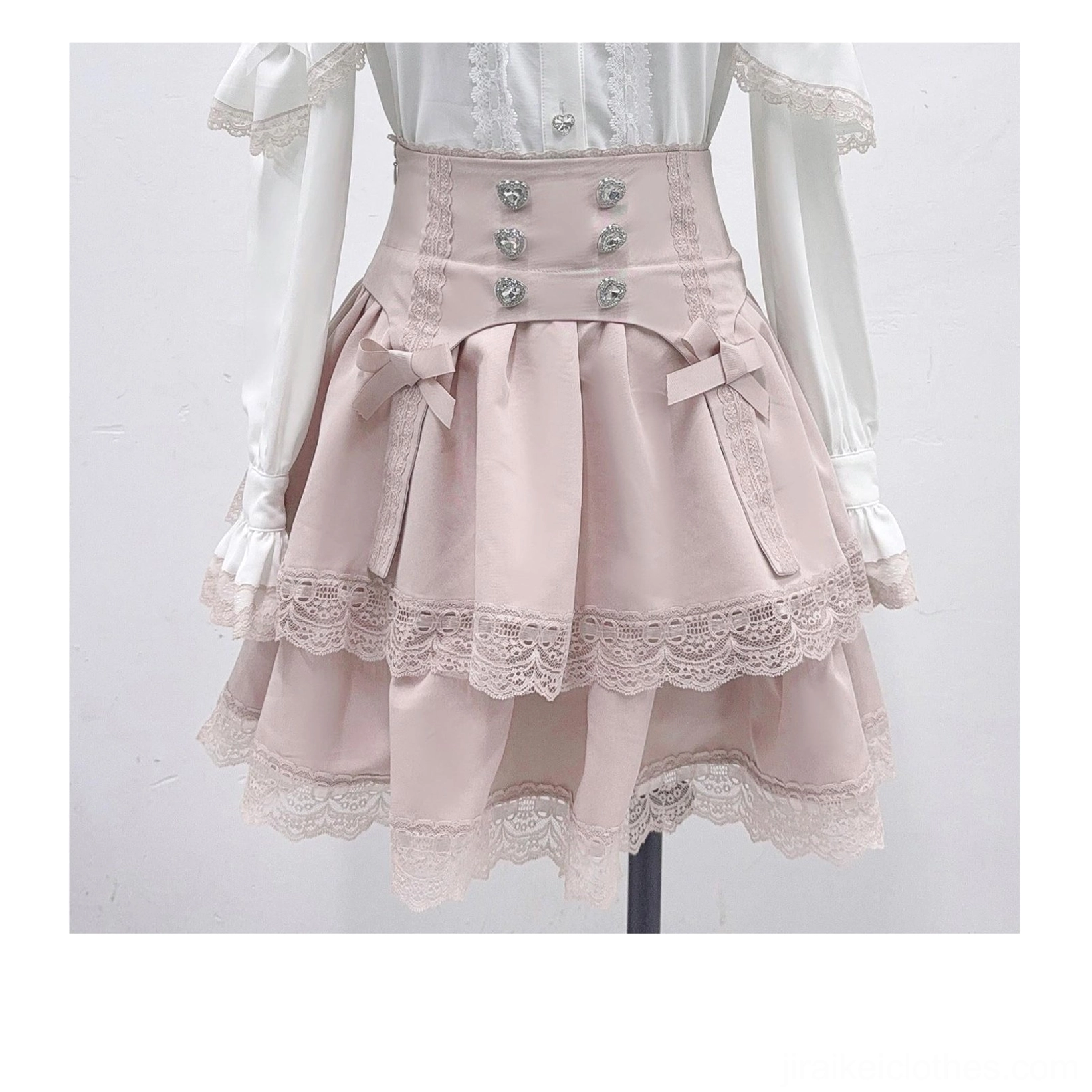 Jirai Kei pink mini skirt with high-waisted silhouette and double lace hem detail for softened aesthetic