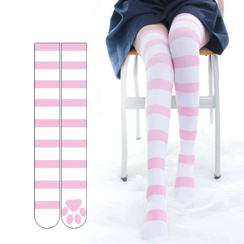 Pink-white horizontal striped over-the-knee socks with paw print embellishment on heel, flat lay product display, cute Jirai Kei aesthetic