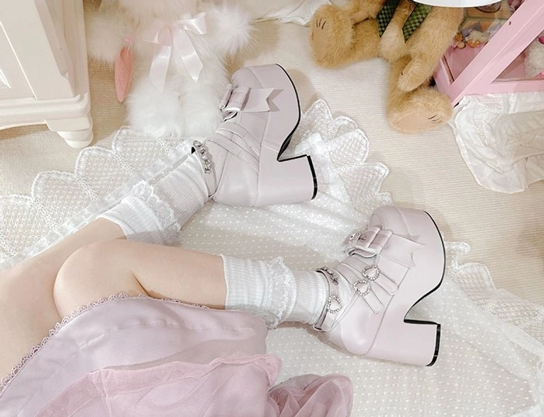 Black and white Jirai Kei platform chunky heel shoes side-by-side comparison showing color contrast and consistent design aesthetic