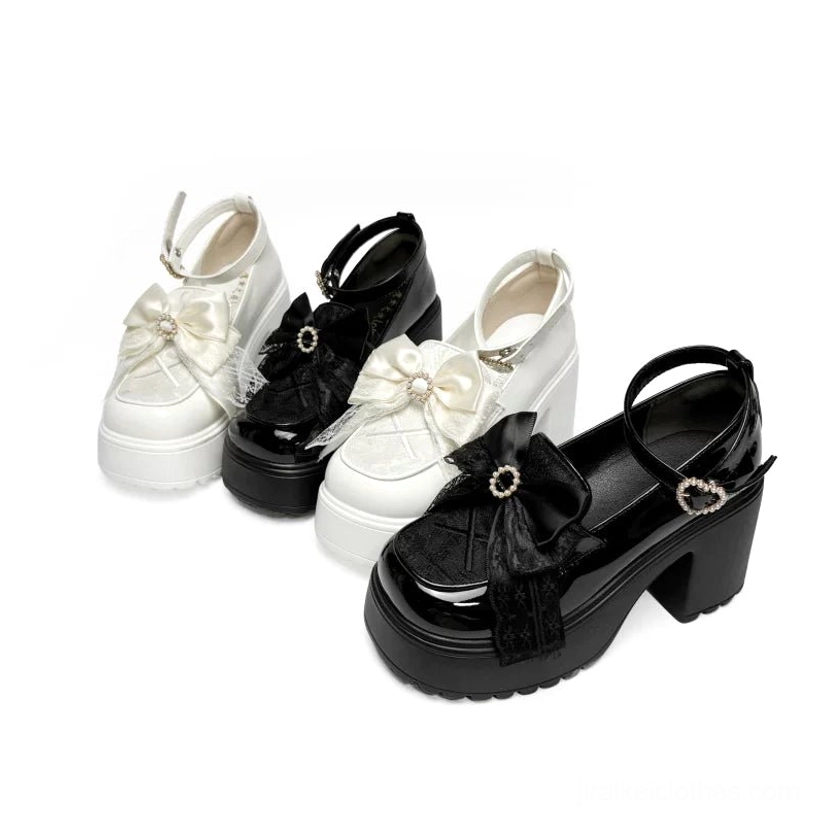 Matching black and white Jirai Kei platform loafers flat lay top-down view on plain white studio background showing both styles with gem-bow decor and chunky platform soles