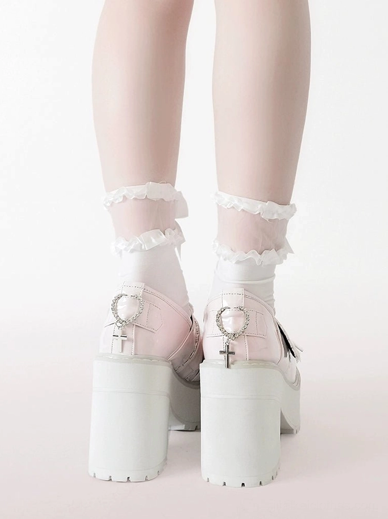Side profile of Jirai Kei heart platform loafers showing complete silhouette from thick platform sole to heel height, structural design, and proportional platform construction