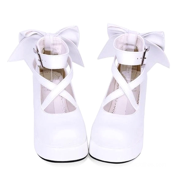 Jirai Kei platform Mary Janes close-up detail shot of metal square buckle, crisscross ankle strap fastening mechanism, secure closure system