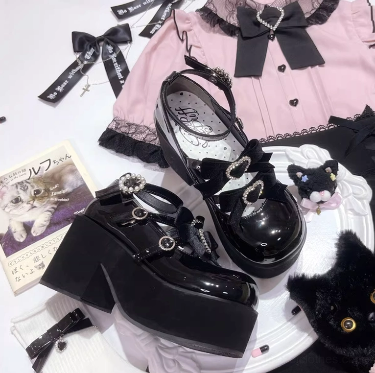 Three-color palette showcase of black, black-pink, and black-purple velvet butterfly platform shoe variants with matching bow and rhinestone details