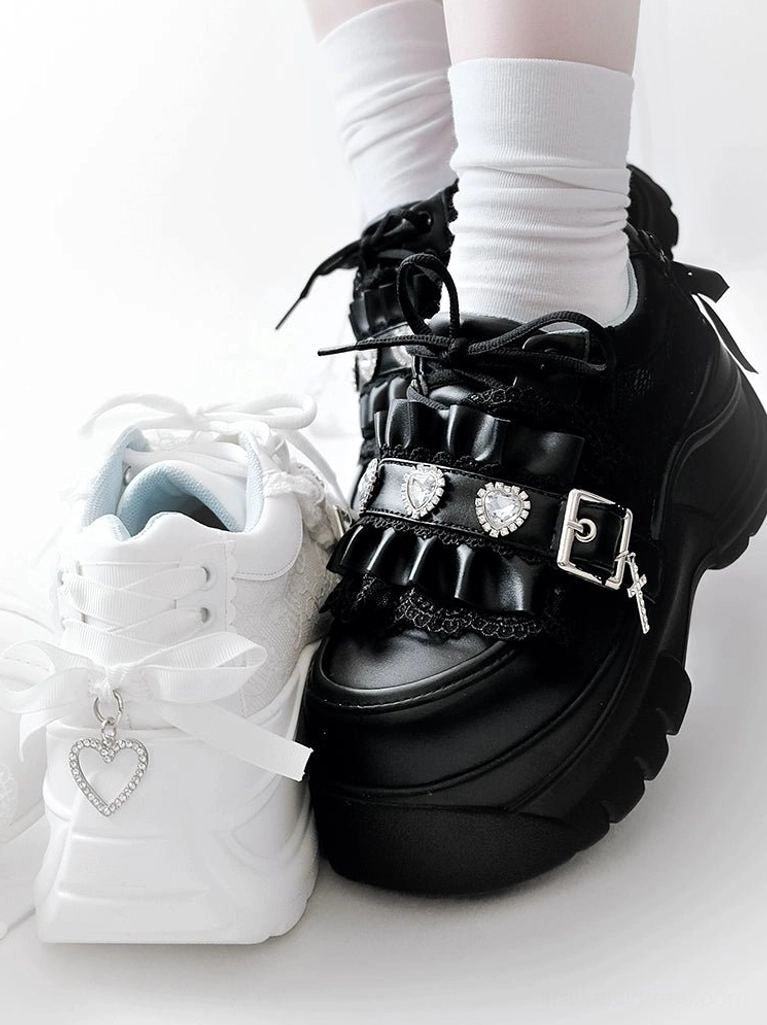 White and black gothic platform shoes side by side frontal comparison heart rhinestone pendant ribbon bow buckle strap cross charm
