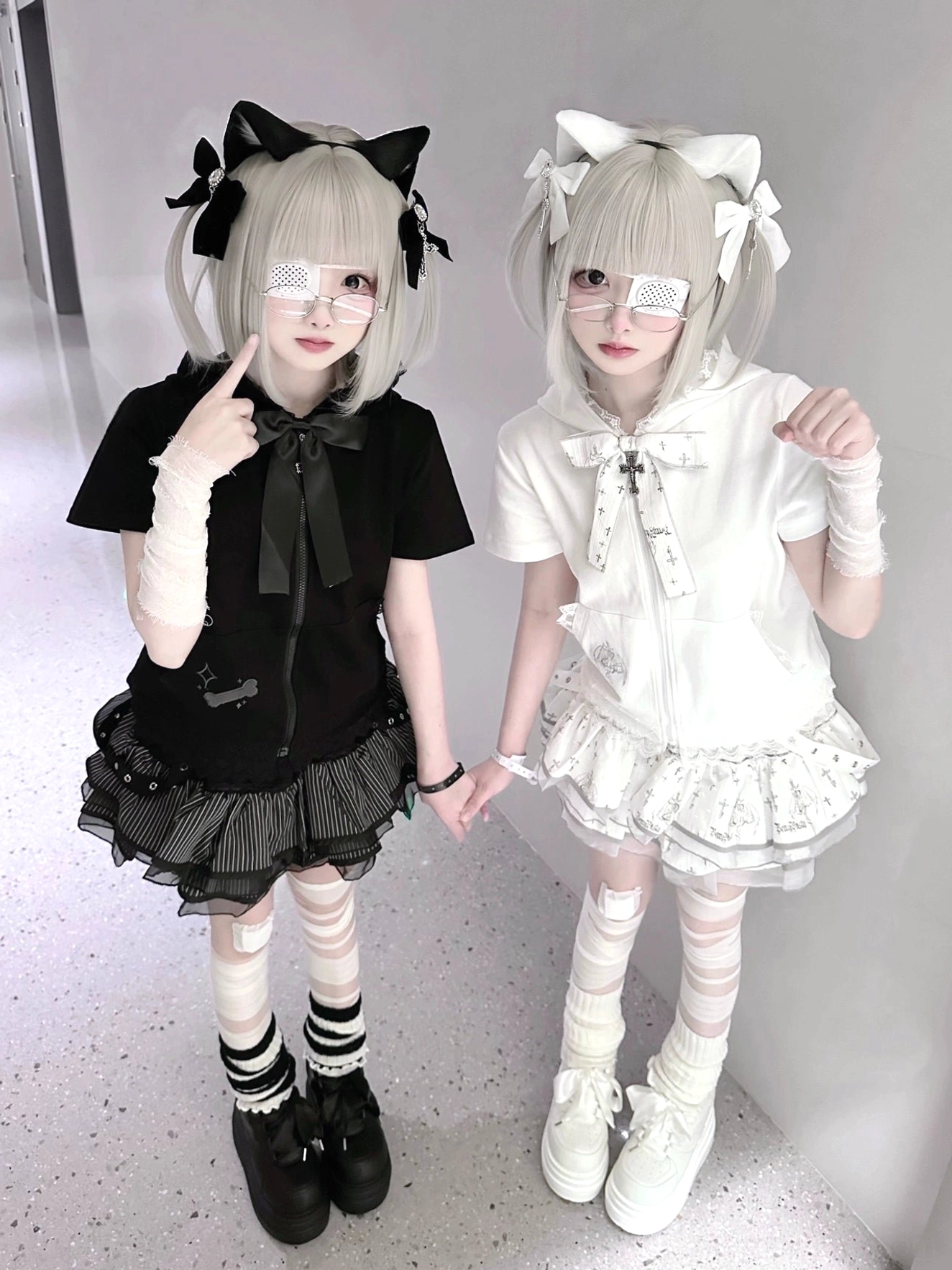 Jirai Kei platform sneakers eye-level front view twin models standing black white dual outfits bow hair accessories