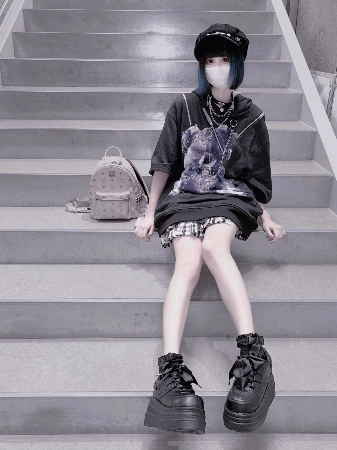 Jirai Kei platform sneakers side oblique view stairwell all-black thick soles goth model casual street style
