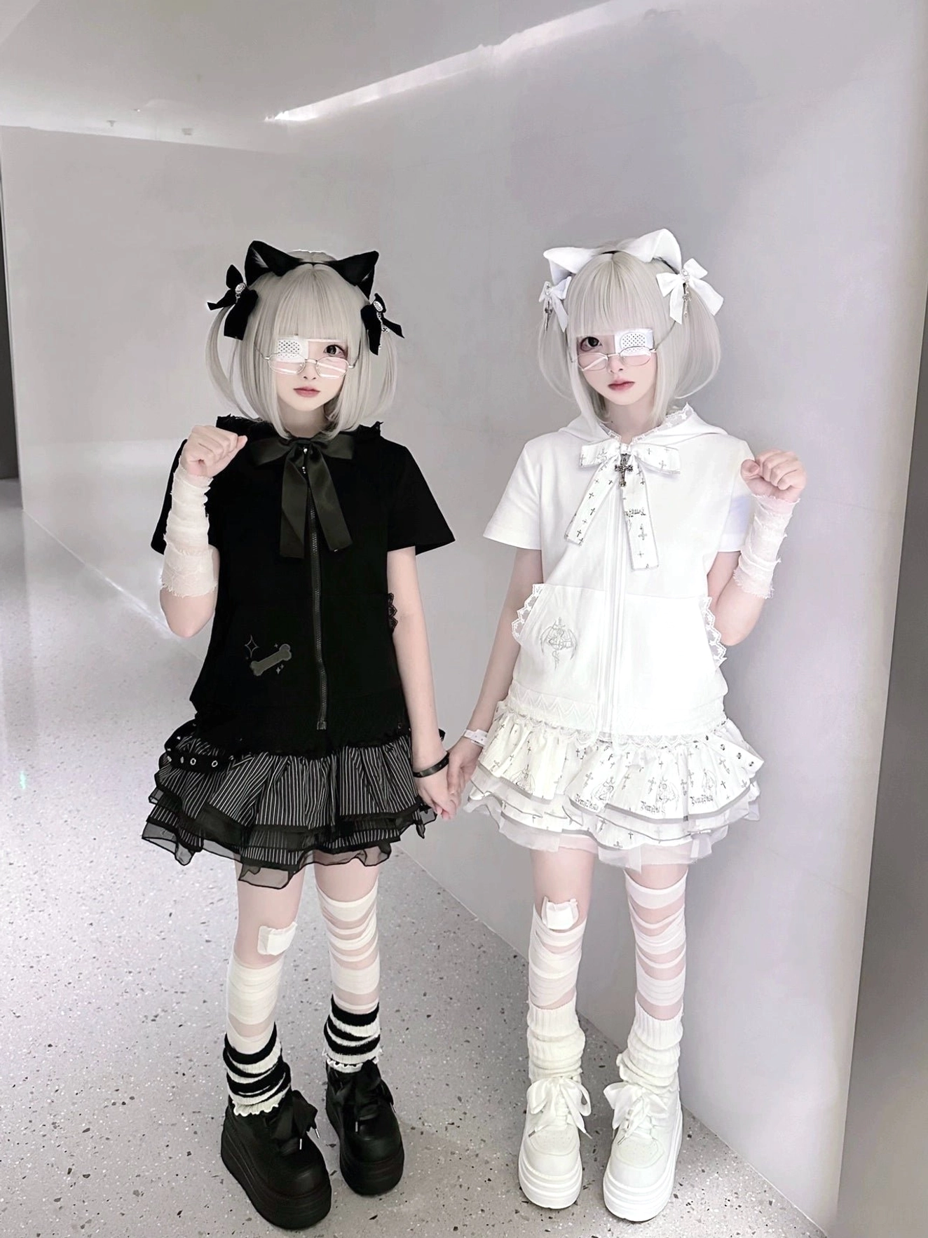 Jirai Kei platform sneakers eye-level front view standing twin models bow-adorned outfits matching twin looks thick platform