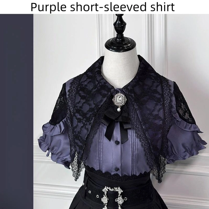 Purple Jirai Kei blouse with black lace capelet close-up detail showing pin tucks ruffled sleeves and decorative belt buckle