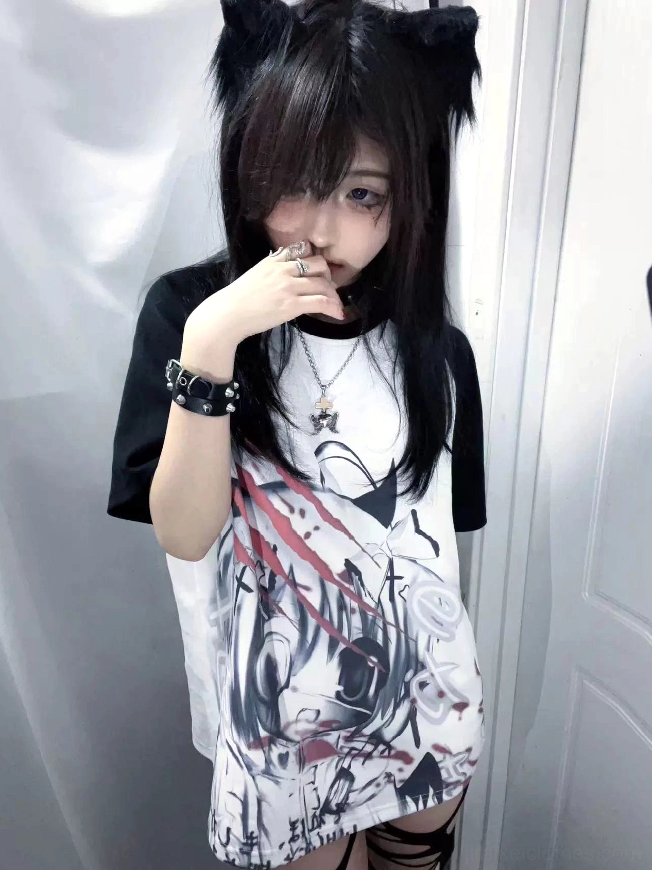 Jirai Kei raglan sleeve graphic T-shirt front view with black contrast sleeves and anime character print in red and gray tones on white base