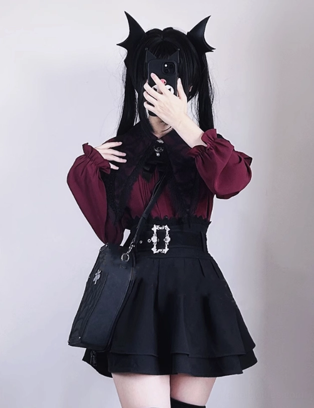 Jirai Kei wine red sailor blouse with black tiered A-line skirt worn by model with cat ear hair clips, front view dark sweet aesthetic