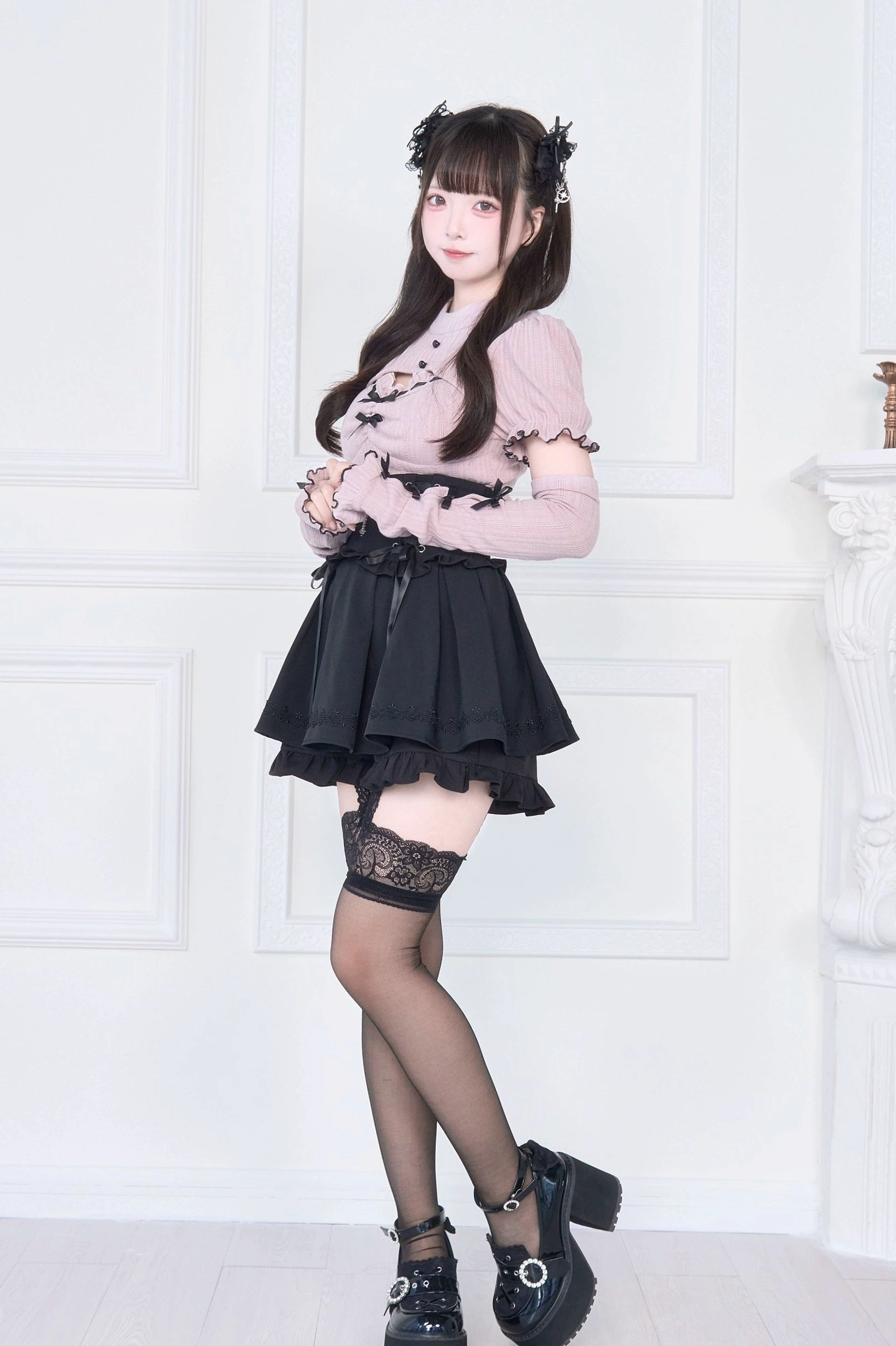 Jirai Kei ruffle skirt detail view showing lace-up waist adjustment ribbon bows and layered ruffle construction