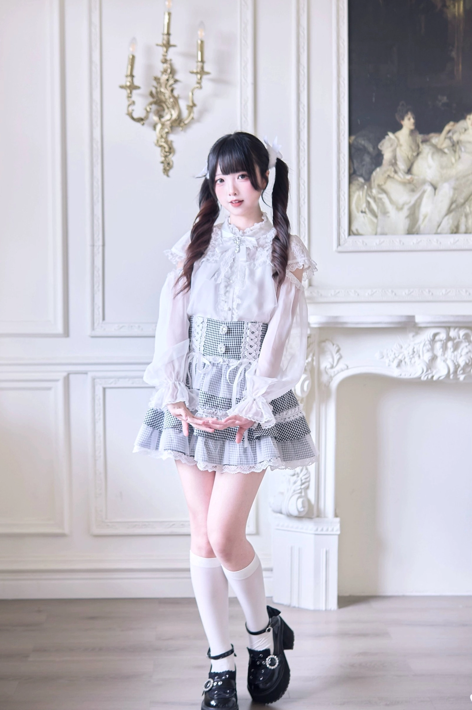 Fabric texture and construction detail of polyester Jirai Kei tiered ruffle skirt highlighting layered aesthetic