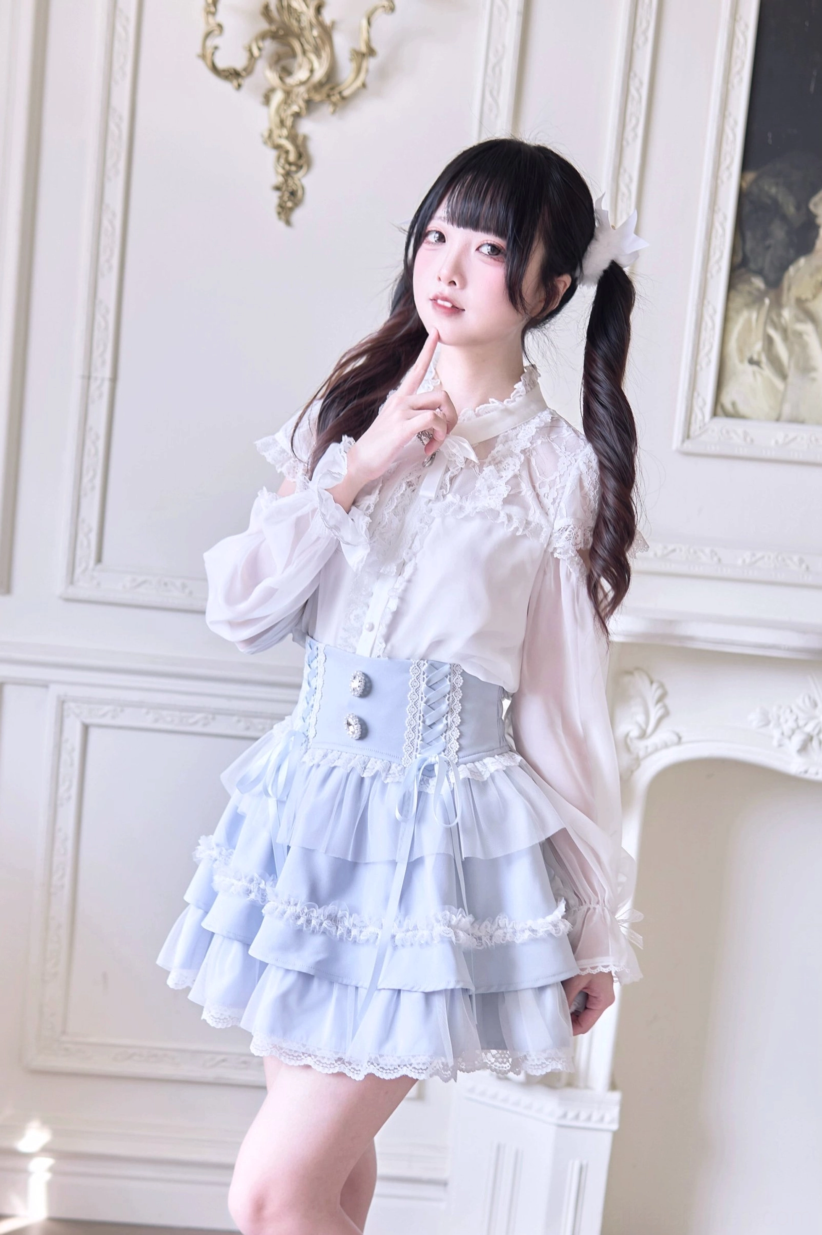 Half-body front shot of elegant Jirai Kei skirt with buttoned corset design in soft water blue coloring