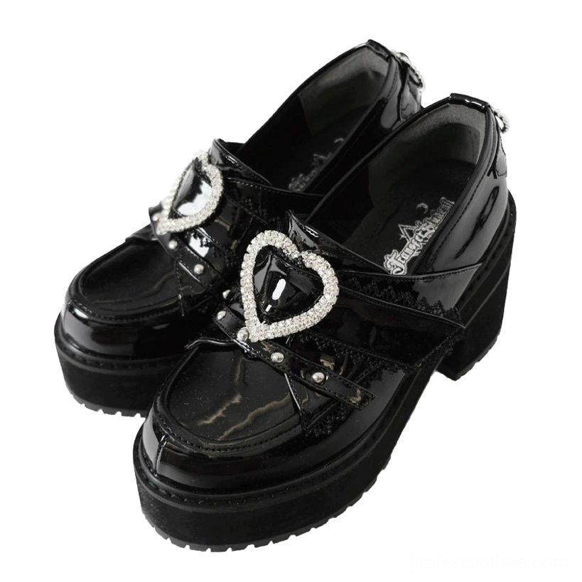 Jirai Kei heart platform loafers in patent black showcasing glossy finish, heart-shaped rhinestone buckle embellishment, adjustable strap with hook-and-loop fastener, and thick platform sole detail