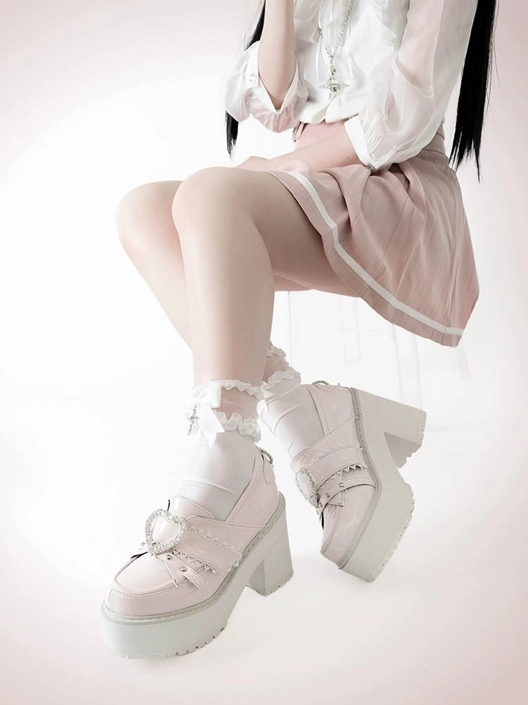 Top-down overhead view of Jirai Kei Ryousangata heart platform loafers showing heart buckle placement, strap configuration, and overall design layout