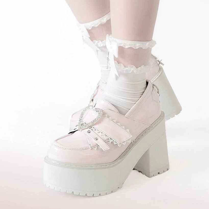Patent pink glossy Jirai Kei Ryousangata platform loafers product shot showing full shoe design, heart buckle embellishment, adjustable strap, and thick platform construction