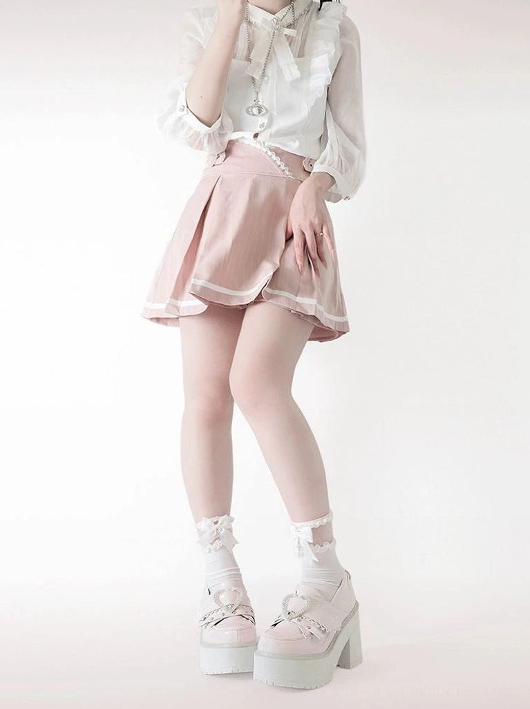 Jirai Kei Ryousangata platform loafers three-quarter view showcasing overall design integration of patent leather, heart buckles, adjustable straps, and decorative elements