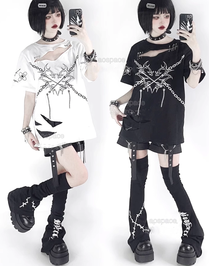 Two models wearing matching black and white jirai kei distressed safety pin t-shirts with chest cutouts and chain print graphics in mirror selfie pose