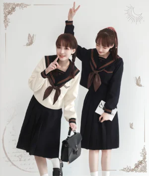 Jirai Kei sailor blouse in cream yellow and dark navy, full body front view on models wearing brown collar trim sailor tops with embroidered chest panel and matching bow ties