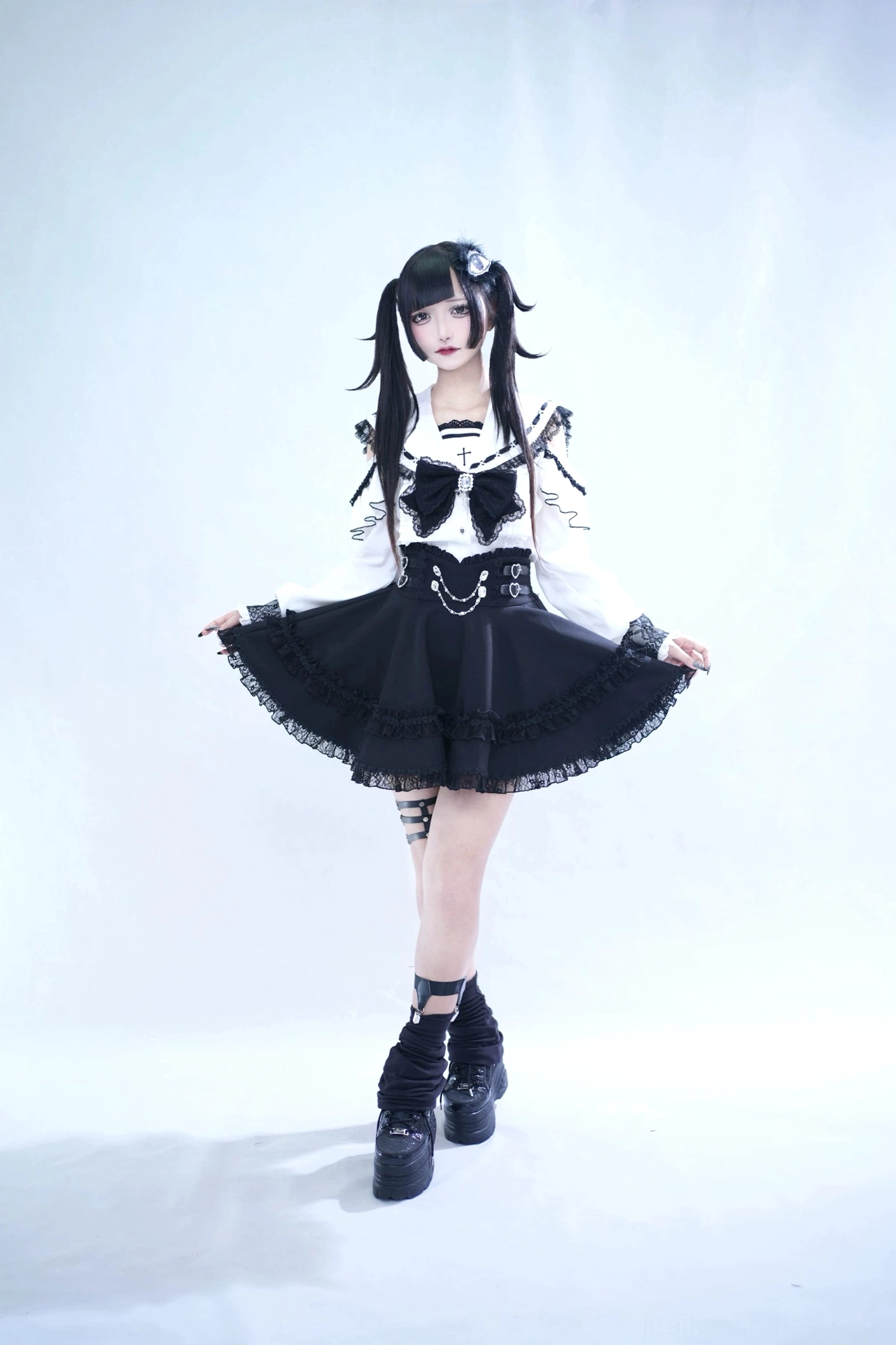 Front-facing Jirai Kei sailor collar blouse alone showcasing rhinestone bow centerpiece, open shoulder design, and lace trim
