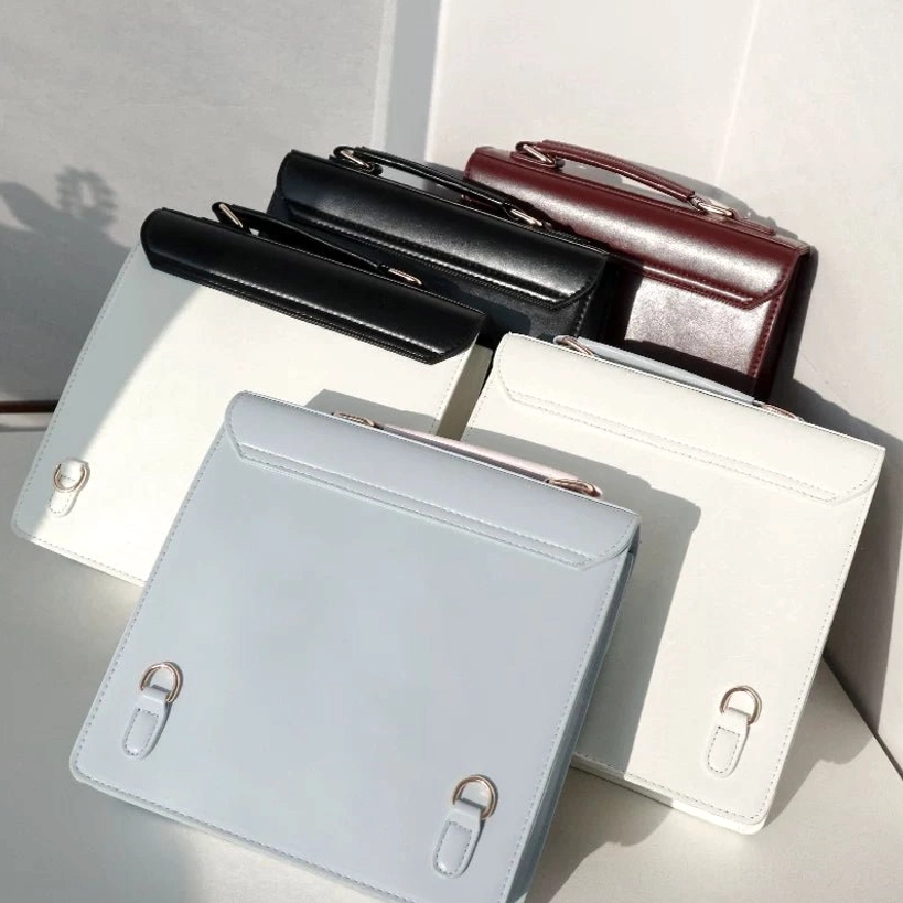 plain jirai kei school ita handbags flat lay top down four color options smooth leather finish metal lock hardware
