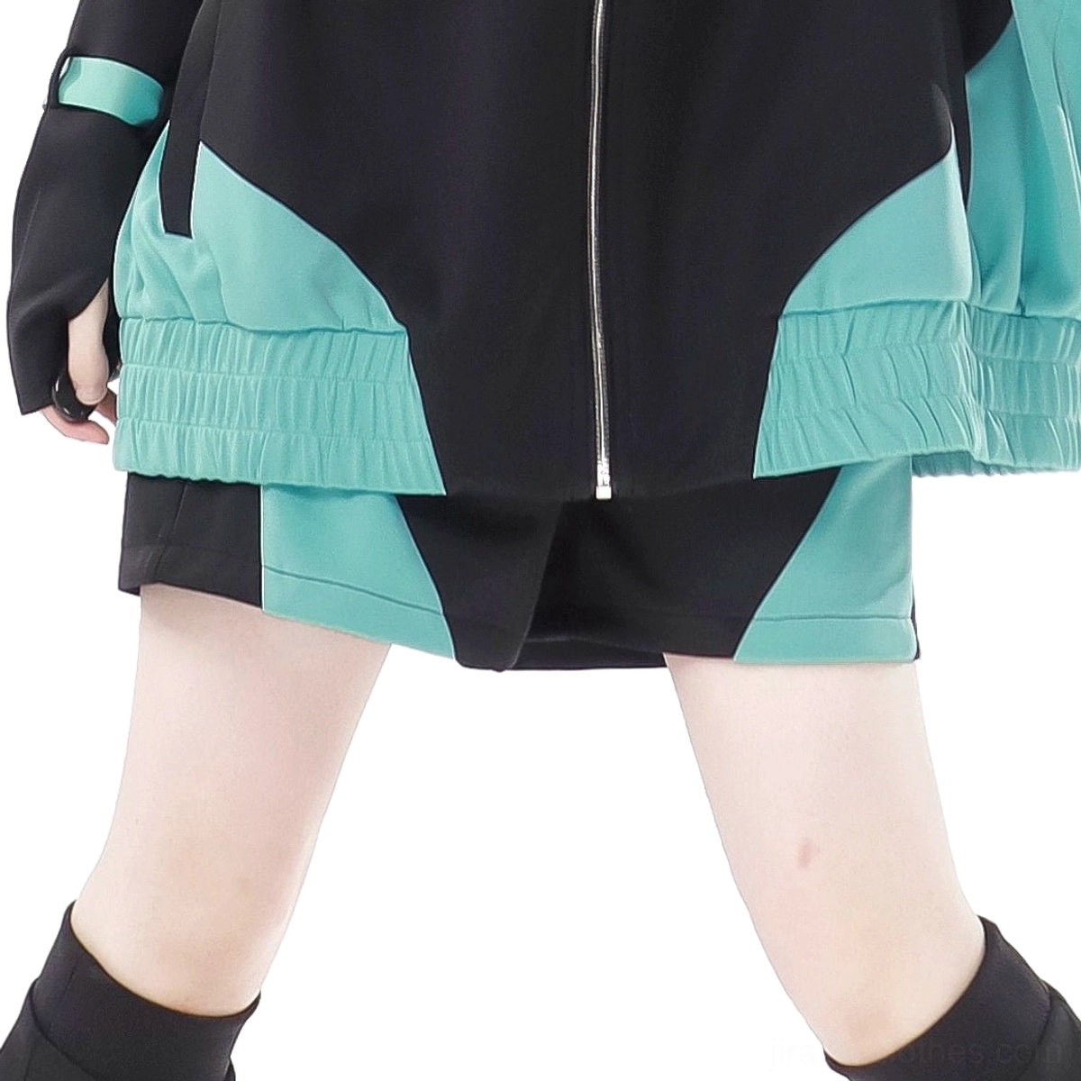Lower torso close-up of Jirai Kei outfit showing elasticated jacket hem matching teal shorts and exposed front zipper detail