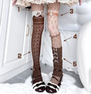 Brown and pink asymmetrical layered Jirai Kei sock set with bows and lace details, paired with mary jane shoes on white fur rug