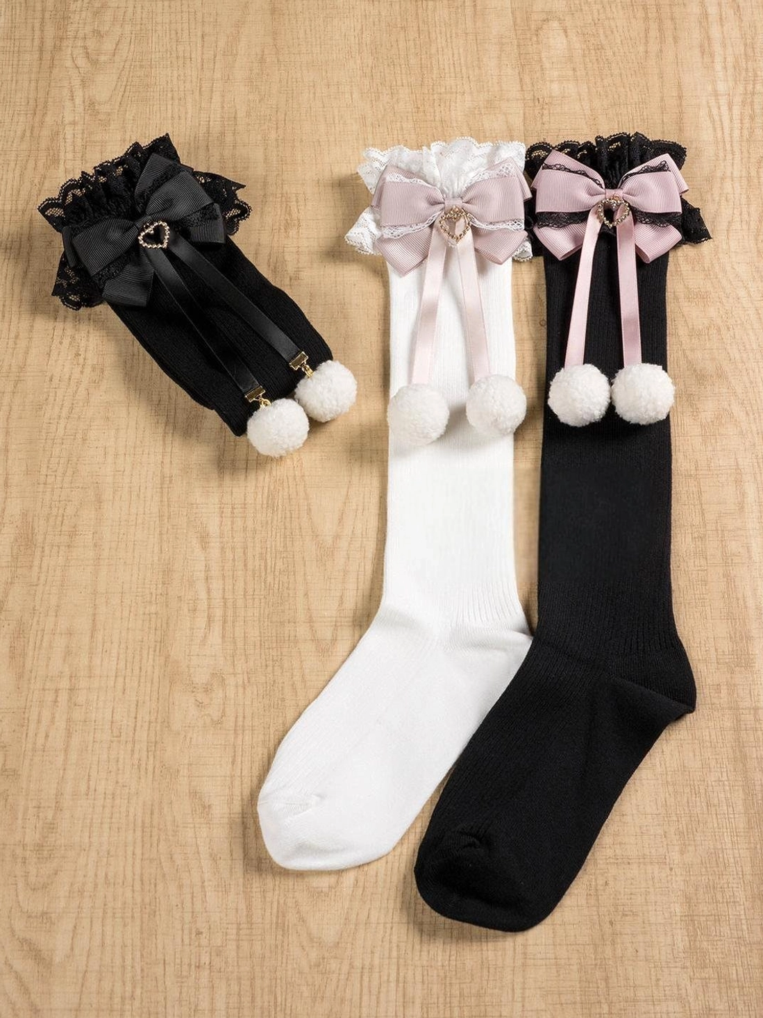 Jirai Kei socks all sizes and colors collection flat lay showing mid-calf and knee-high options in white-pink black-pink and black colorways complete wardrobe view