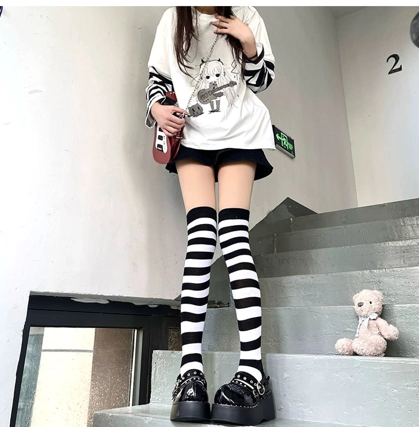 Jirai Kei striped knee-high socks collection display multiple colorways, flat lay comparison view, horizontal stripe details