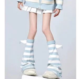 Jirai Kei striped leg warmers with angel wings decoration worn with blue-white cardigan and pleated mini skirt full-body styling