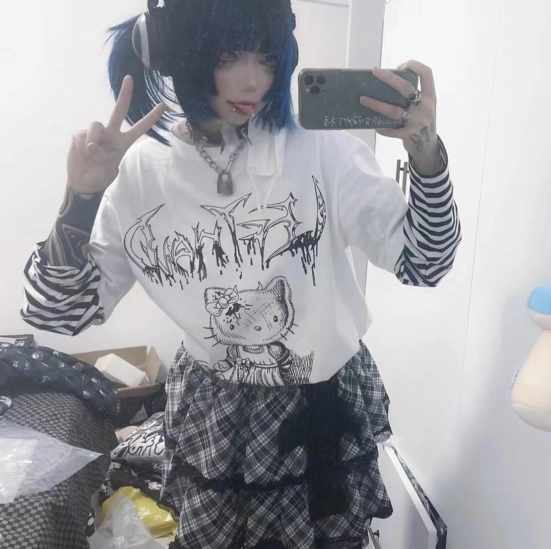 Jirai kei long sleeve false two-piece striped punk tee worn with subculture style accessories and outfit coordination