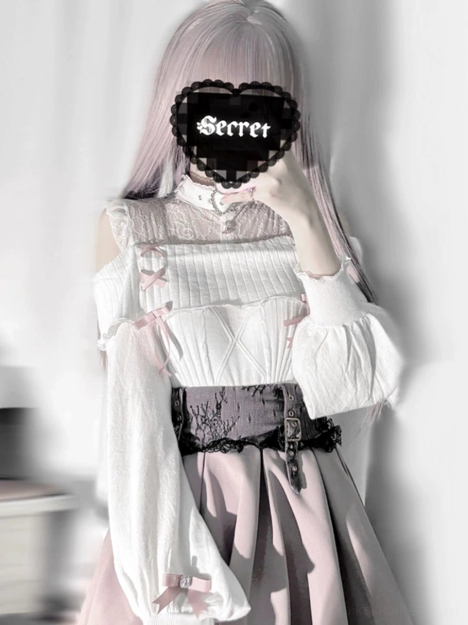 Black Jirai Kei off-shoulder sweater texture close-up showing knitted fabric quality and lace patterning intricacy