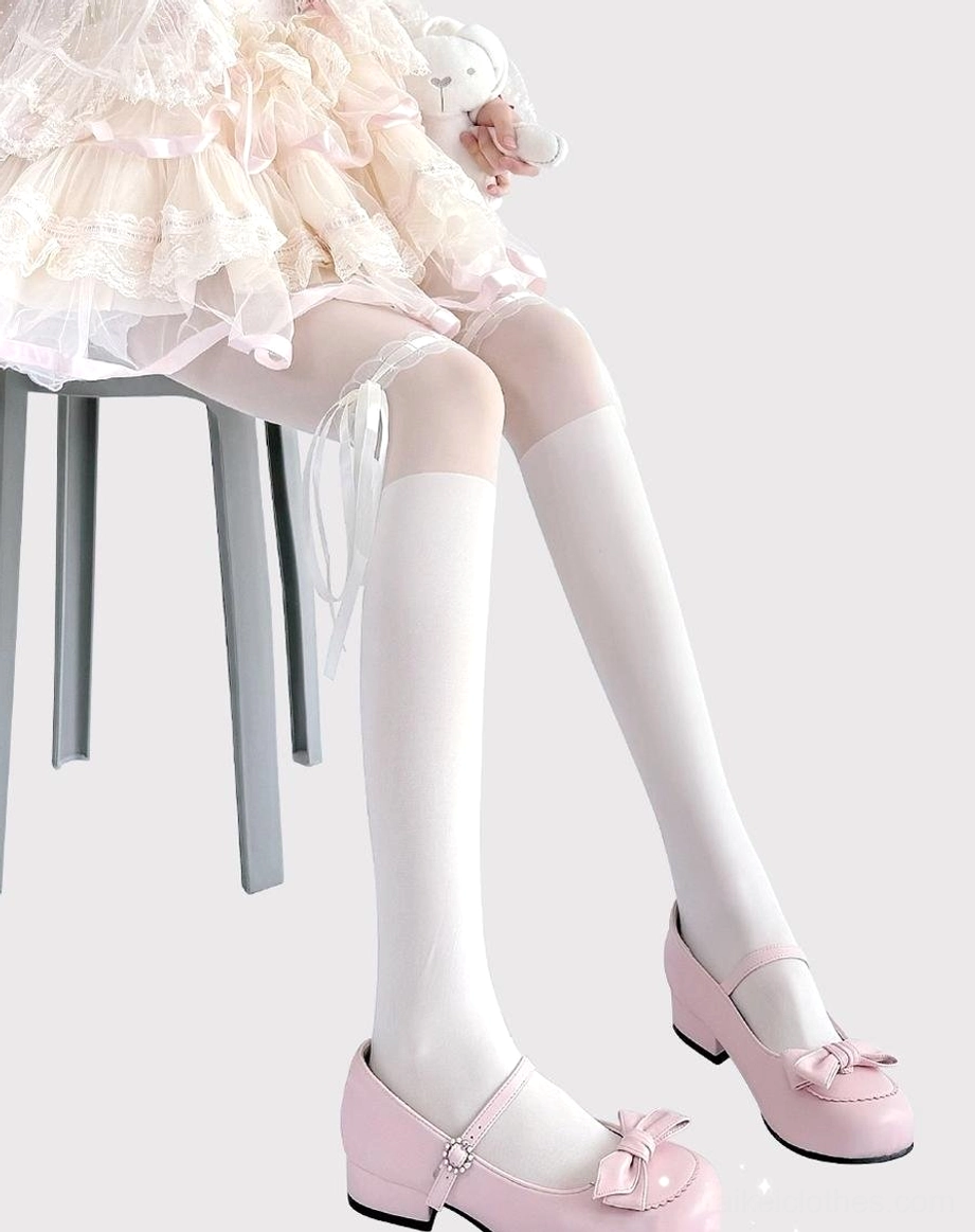 Jirai Kei thigh-high lace socks detail shot ribbon bow embellishment craftsmanship