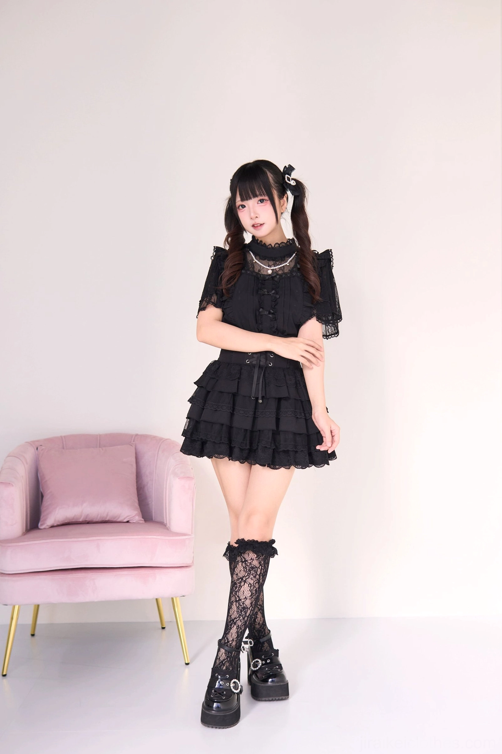 Jirai kei tiered cake skirt back construction detail showing zipper closure elastic waistband and layered ruffle architecture of gothic lolita skirt