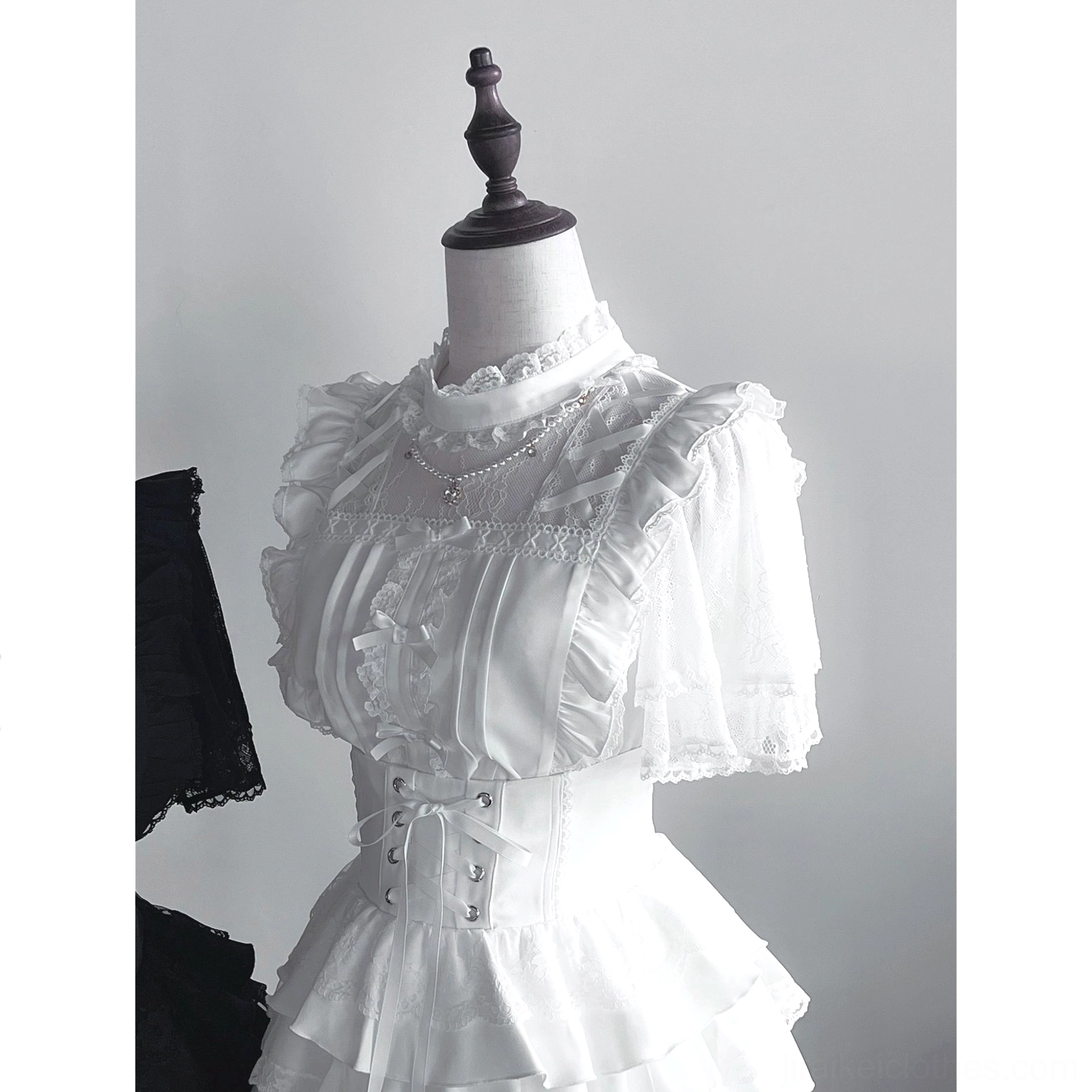 Jirai kei tiered cake skirt color comparison showing black plaid and white variations of gothic lolita tiered ruffle skirt options