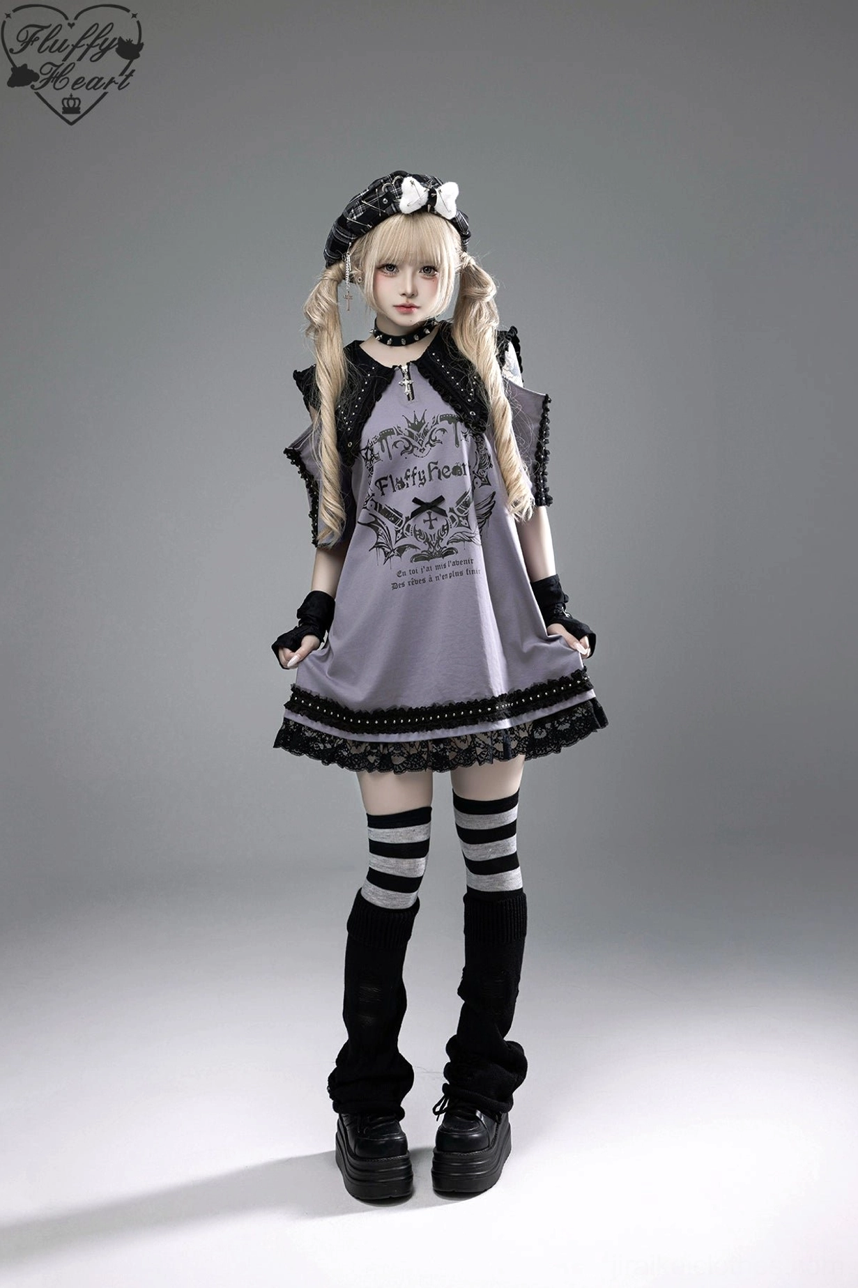 Jirai Kei T-shirt dress detail shot showing cross zipper pendant hanging against graphic print and fabric