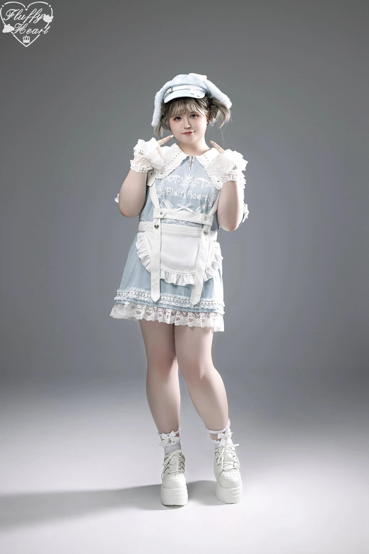 Jirai Kei T-shirt dress worn with knee-high socks and alternative footwear showing complete lower-body outfit coordination