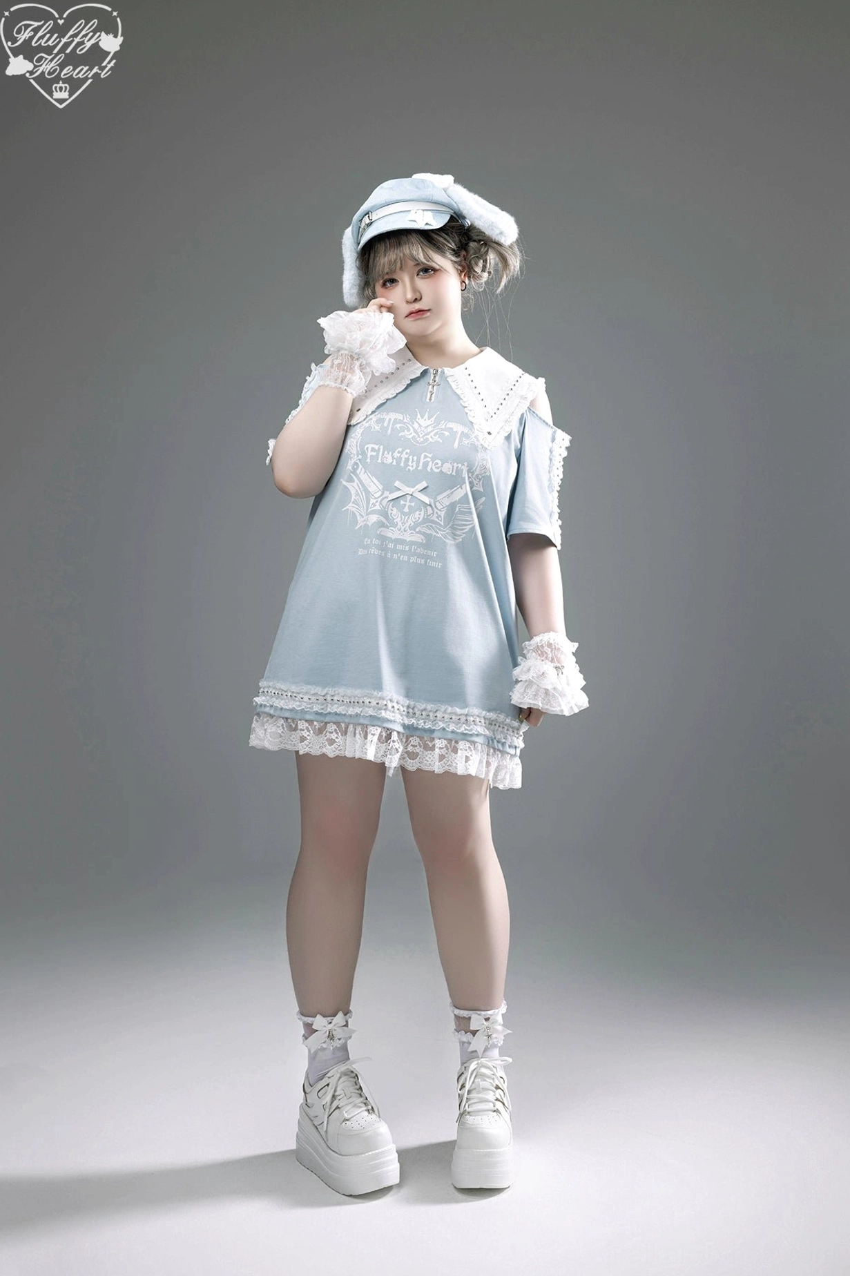 Jirai Kei dress styled with occult-inspired accessories cross pendants and chain details emphasizing gothic narrative
