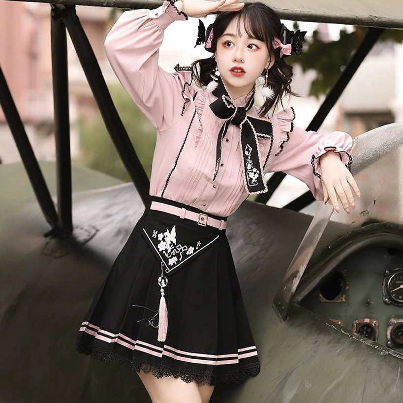 Complete Jirai Kei two-piece set color blocking composition with pink blouse and black skirt creating visual contrast and aesthetic tension
