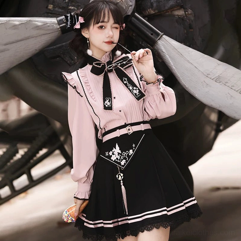 Size reference image of Jirai Kei blouse and skirt ensemble showing fit proportions and draping on model for accurate sizing guidance