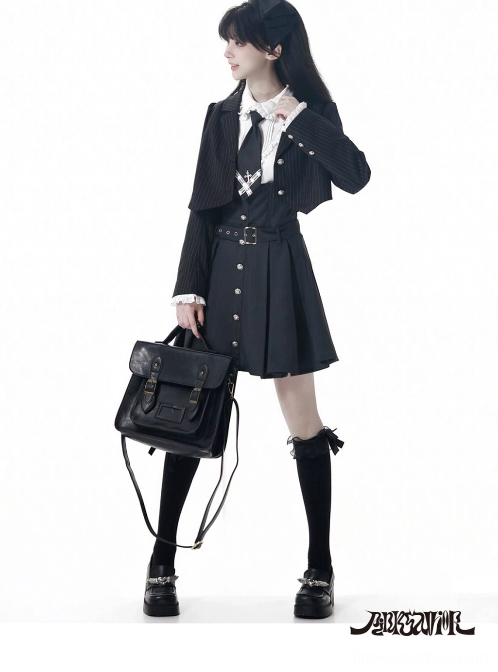 Jirai Kei JK uniform side three-quarter view displaying cropped blazer lapel design, pleated skirt proportions, formal loafers, and tailored silhouette on female model studio setting