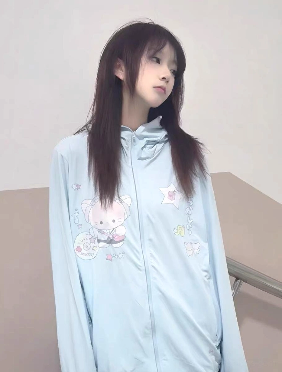 Jirai kei water blue UV protection jacket with playful cat and star print details, detachable hood design for customizable sun coverage and styling flexibility