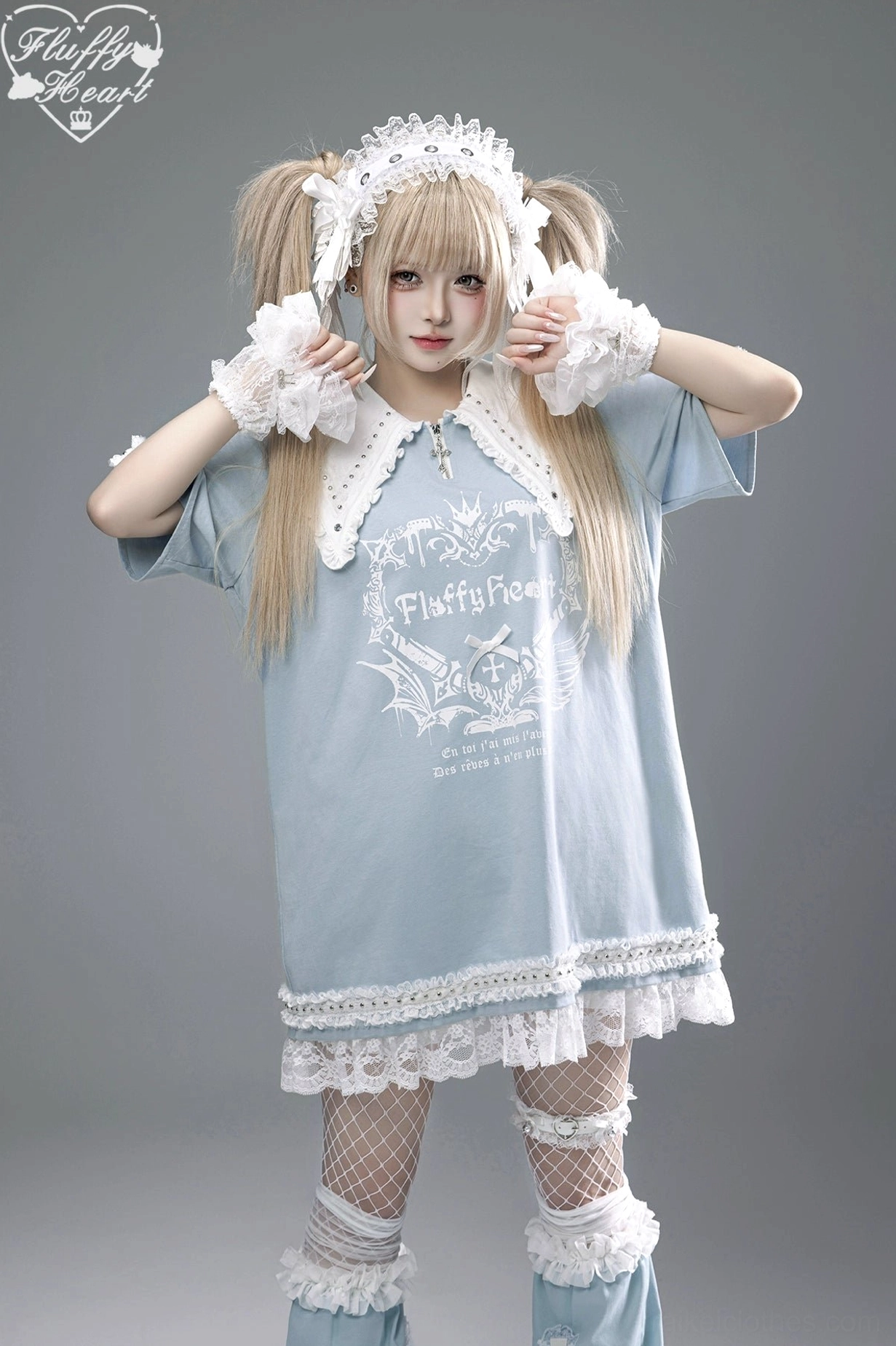Water blue off-shoulder Jirai Kei T-shirt dress featuring white peter pan collar, lace-trimmed hem, gothic graphic print, and white lace gloves on blonde model