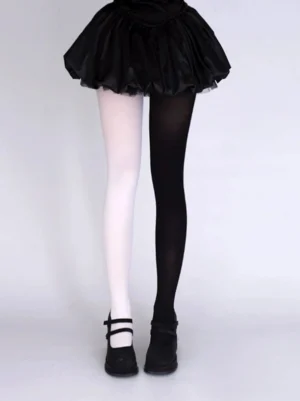 White and black split velvet jirai kei pantyhose full leg view with black ruffle skirt and mary jane shoes