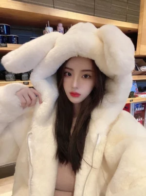 Jirai Kei white bunny ear fleece coat three-quarter front shot showing full zip-up front design and oversized hood