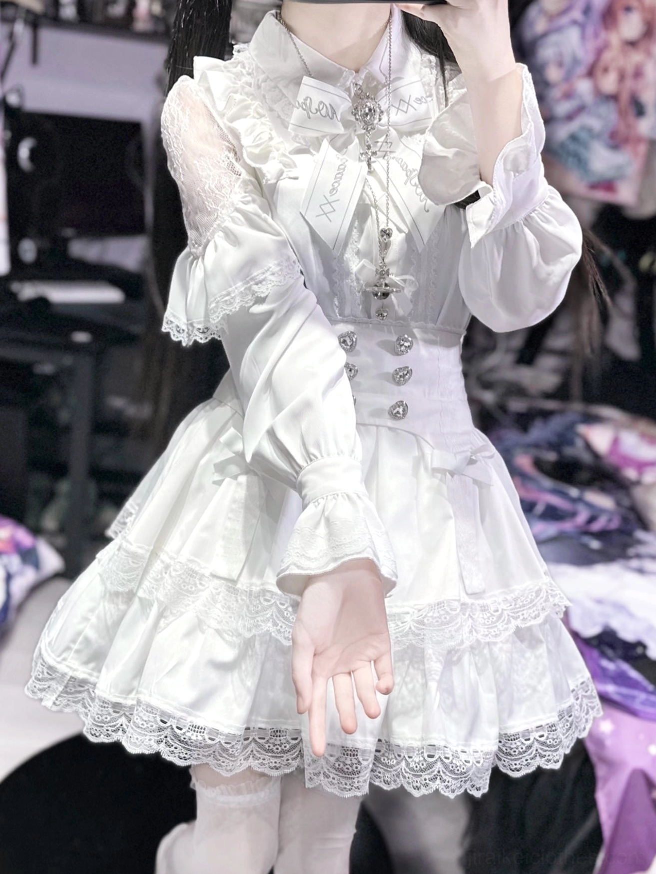 Jirai Kei white frilled lolita ensemble half-body front close-up with lace trim buttoned waist and cross pendant
