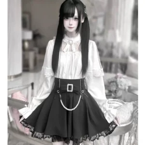 Jirai Kei white lace hollow-out blouse front view with elastic flare cuffs mesh patchwork long sleeves full body model shot