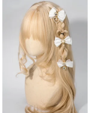 White layered lace bow hair clip with metal charms and pearl details on blonde curly braided wig - Jirai Kei barrette side angle styling