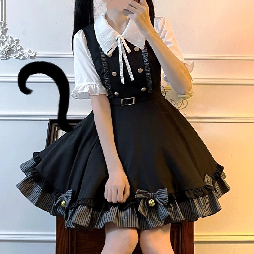 Close-up half-body selfie of Jirai Kei school outfit showcasing lace collar bow, ruffled short sleeves, and double row of gold metal buttons on white blouse paired with black skirt